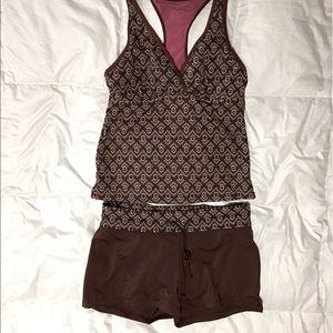 Athleta swimsuit. Good used condition. No flaws. Medium top, small bottom.